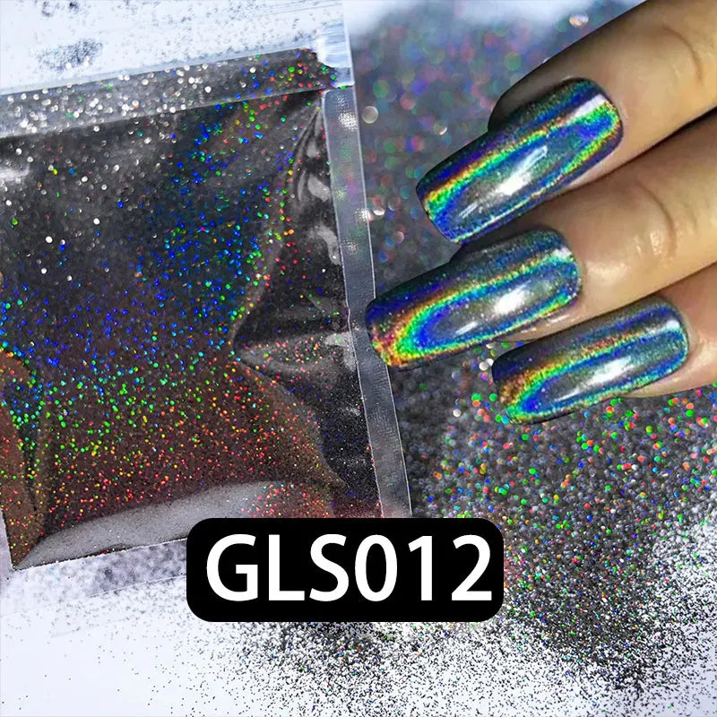 A hand displays a nail coated with iridescent holographic rainbow glitter dust for DIY nail art.