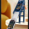 A black racing car is sliding down a clear track on a wooden table, demonstrating gravity.