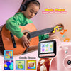 A child plays an acoustic guitar while interacting with a pink instant print camera featuring puzzle and music games.