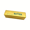 A rectangular gold butter squishy stress relief toy labeled salted butter.