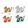 A set of six dragon-like animal building blocks in gold, silver, and blue colors.