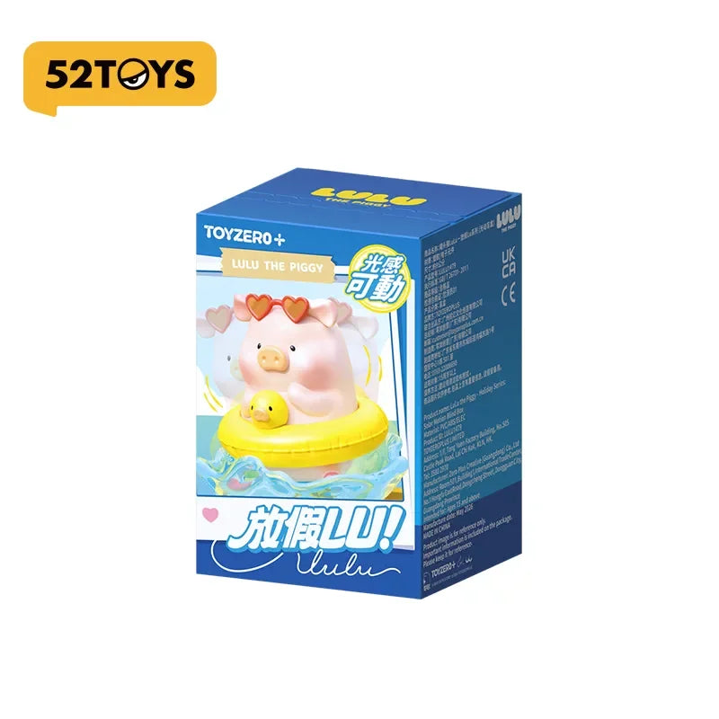 A box of Lulu the Piggy light-sensing movable figurine for collectible desktop decor.
