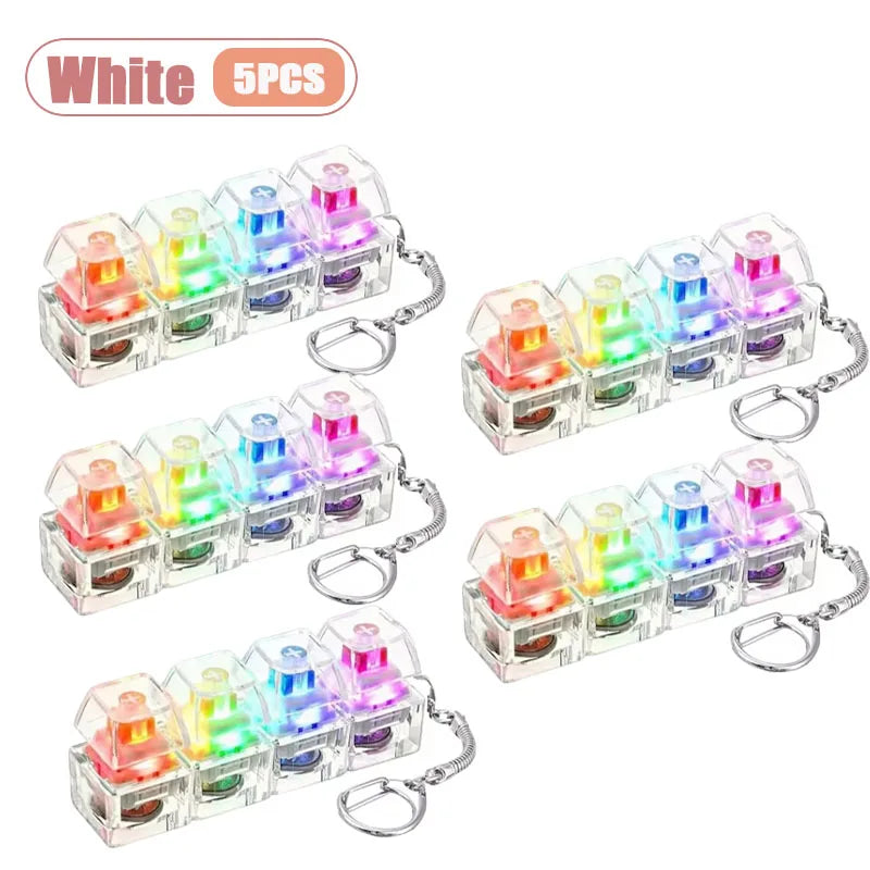 Five white LED keyboard keycap fidget flashlights packaged as a keychain set
