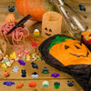 A collection of Halloween squishy stress relief toys including ghost, cat, and pumpkin-themed mochi squishies.