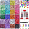 A collection of various colored flat-back rhinestones and glitter for DIY crafts