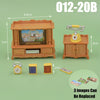 A dollhouse furniture playset featuring a miniature kitchen and living room set with various accessories.