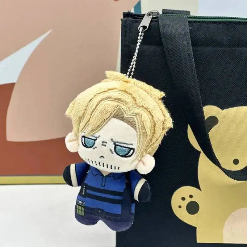 A plush doll set featuring characters Leon and Ashley from Resident Evil 9, displayed against a black bag.