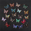A collection of sparkling crystal butterfly charm beads in various colors and finishes for jewelry making.