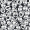 A close-up view of small, silver-colored pony beads for jewelry making and crafts.