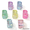 A collection of colorful acrylic alphabet beads in various shades of purple, blue, and pink.