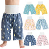 A collection of waterproof baby diaper pants with skirts in various patterns and colors for potty training.