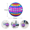 Jouet balle magique tournante avec lumières LED colorées, vu sous divers angles.