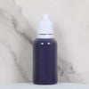 A dark purple bottle of water marbling paint art kit for kids with a white cap