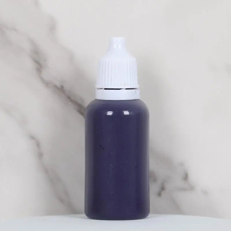 A dark purple bottle of water marbling paint art kit for kids with a white cap