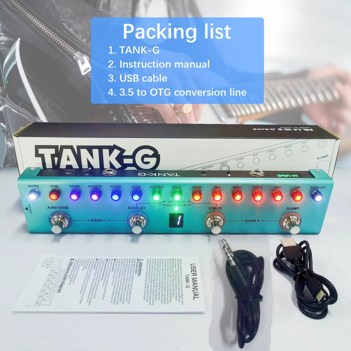 Tank-G portable guitar multi-effects processor with an instruction manual and USB cable.