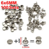 A set of 100 silver-toned metal hardware components including eyelets and findings for crafts and sewing projects