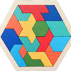 A wooden tangram puzzle set with colorful geometric shapes arranged in a hexagonal frame.