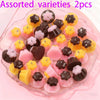 Assorted varieties of pudding-shaped resin pendants for DIY jewelry making in yellow, pink, and dark brown colors