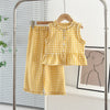 A yellow gingham lace vest and wide-leg pants set displayed on a hanger.