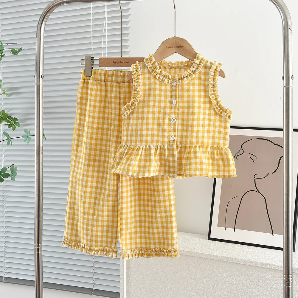 A yellow gingham lace vest and wide-leg pants set displayed on a hanger.