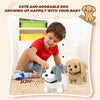 A young boy is playing with an electric plush puppy toy while growing up happily with his baby.