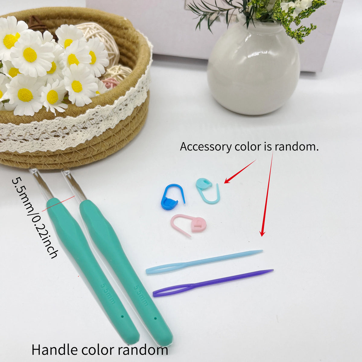 A set of ergonomic crochet hooks, stitch markers, and needles with various colors displayed on a white surface.