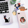 A collection of anime-themed waterproof stickers featuring characters like cats and people on a white surface.