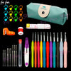 A collection of crochet hooks and knitting needles displayed next to a green storage bag.