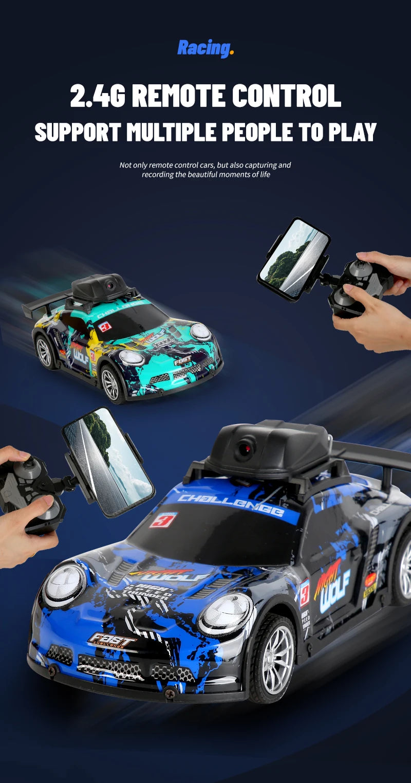 A blue and black remote control racing car with an HD camera mounted on the front, shown in action.