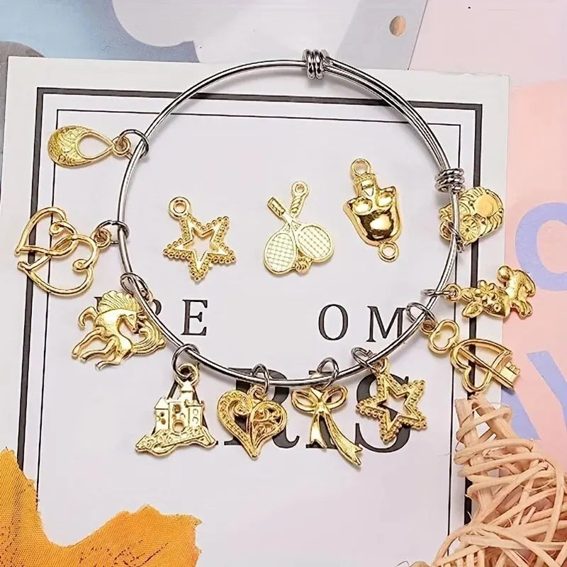 A silver-tone jewelry making kit featuring adjustable bangles and charms displayed on a white card.