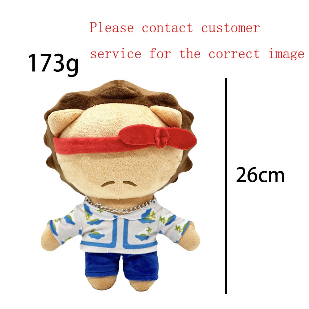 A plush doll resembling Eminem, XXXTentacion, and Frank Ocean with brown hair, a red headband, a white shirt, and blue pants.