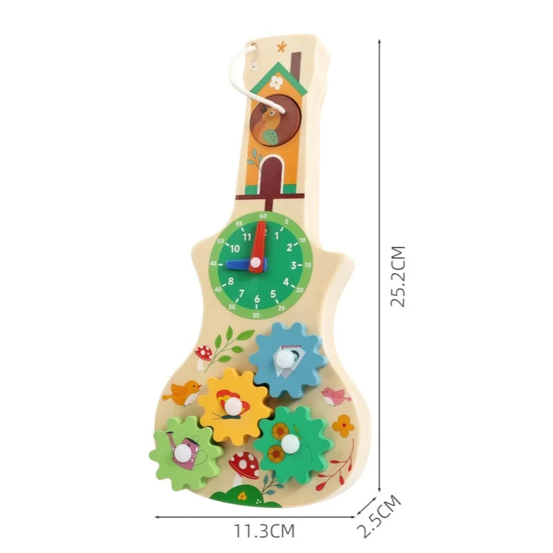 A wooden busy board featuring musical activities and a house design for children.