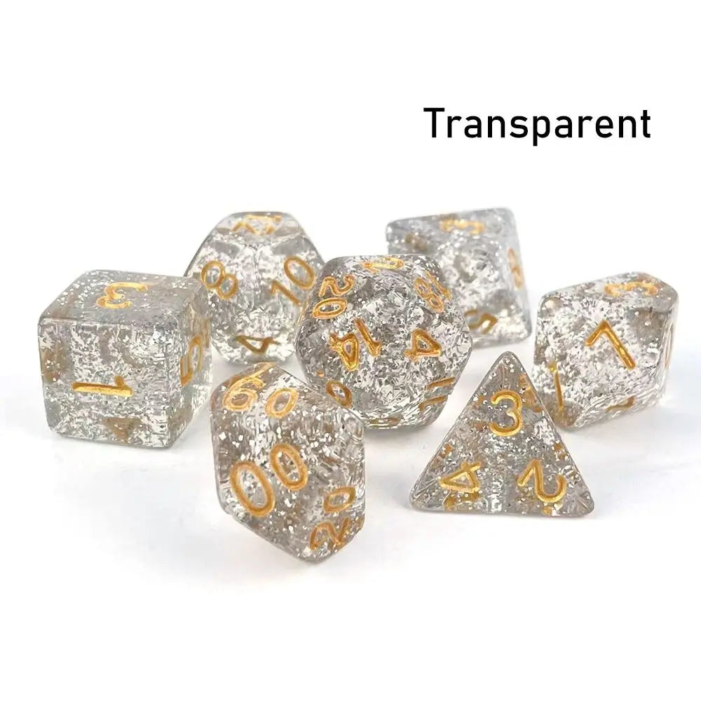 A set of seven transparent acrylic polyhedral dice, including a d10 and a triangle, scattered on a white surface.
