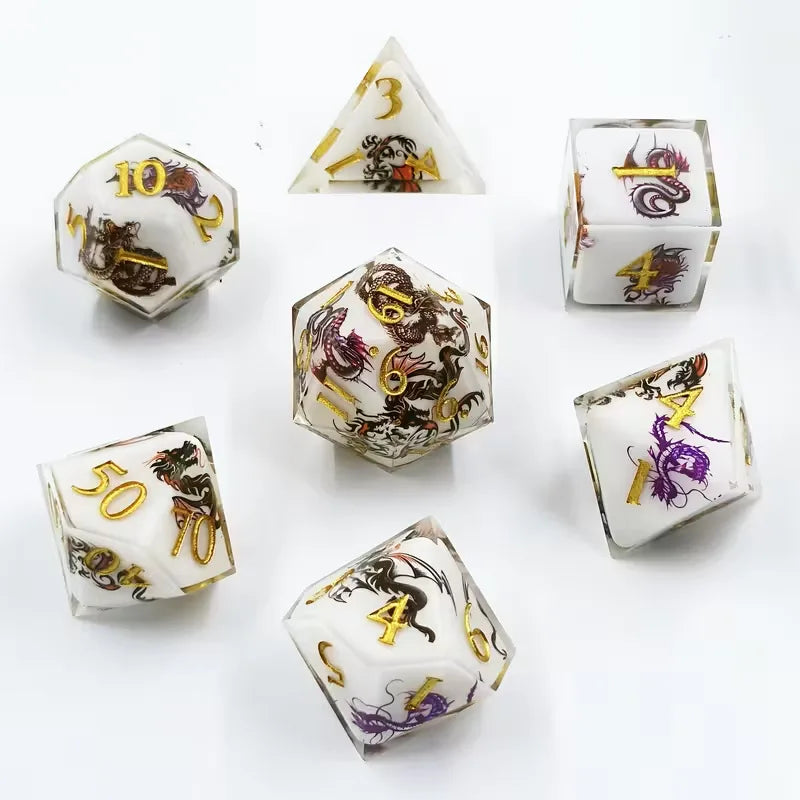 A set of milk white resin dice featuring a black kitten design, displayed at various angles.