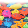 A collection of colorful magnetic fishing game toys including fish and starfish for kids