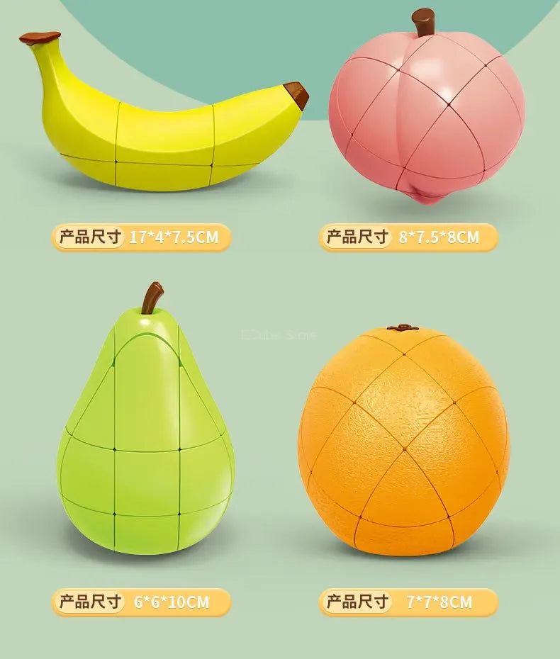 Three fruit-shaped puzzle cubes: a yellow banana, a pink pumpkin, and a green pear.