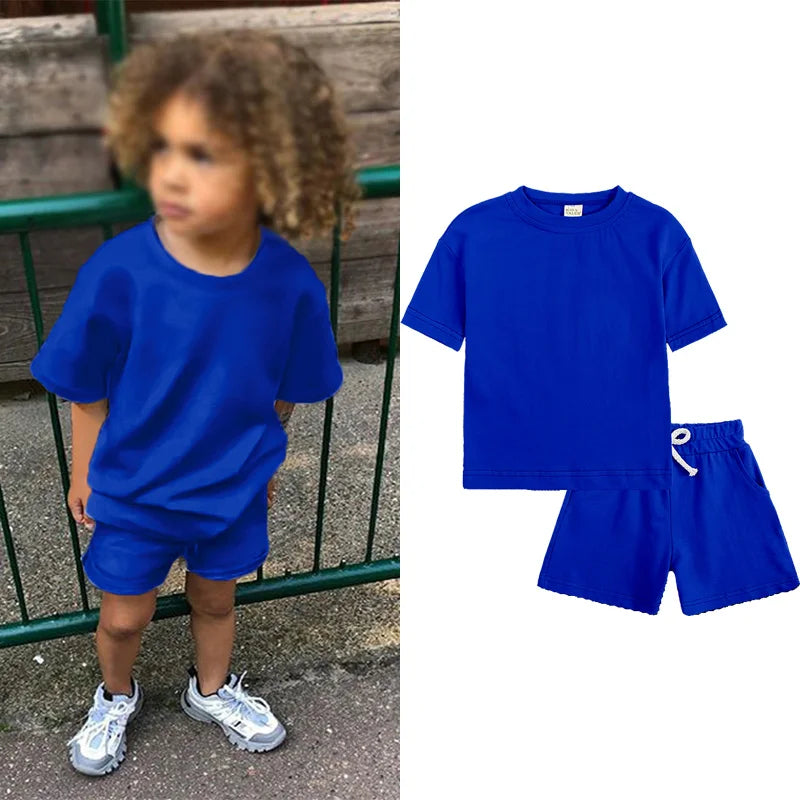 A royal blue kids' summer tracksuit set featuring a short sleeve top and matching shorts.