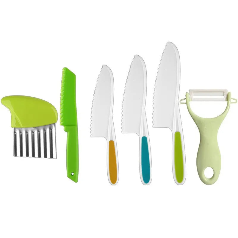 A set of five plastic play knives in various shades of green and white, including a large knife and a small plastic tool.