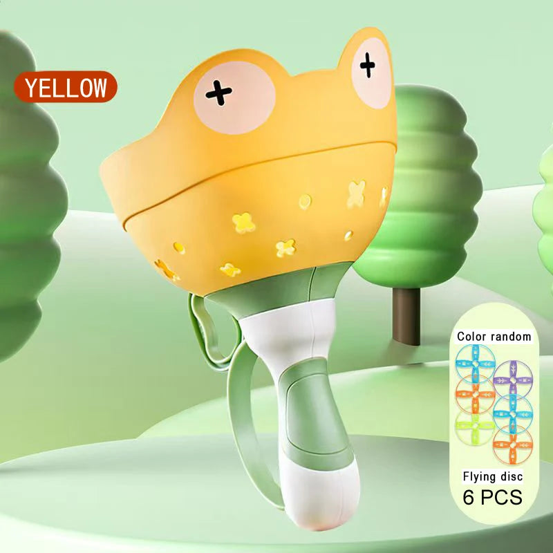 A yellow pull-string flying saucer launcher toy for kids with six discs shown against a light green background.