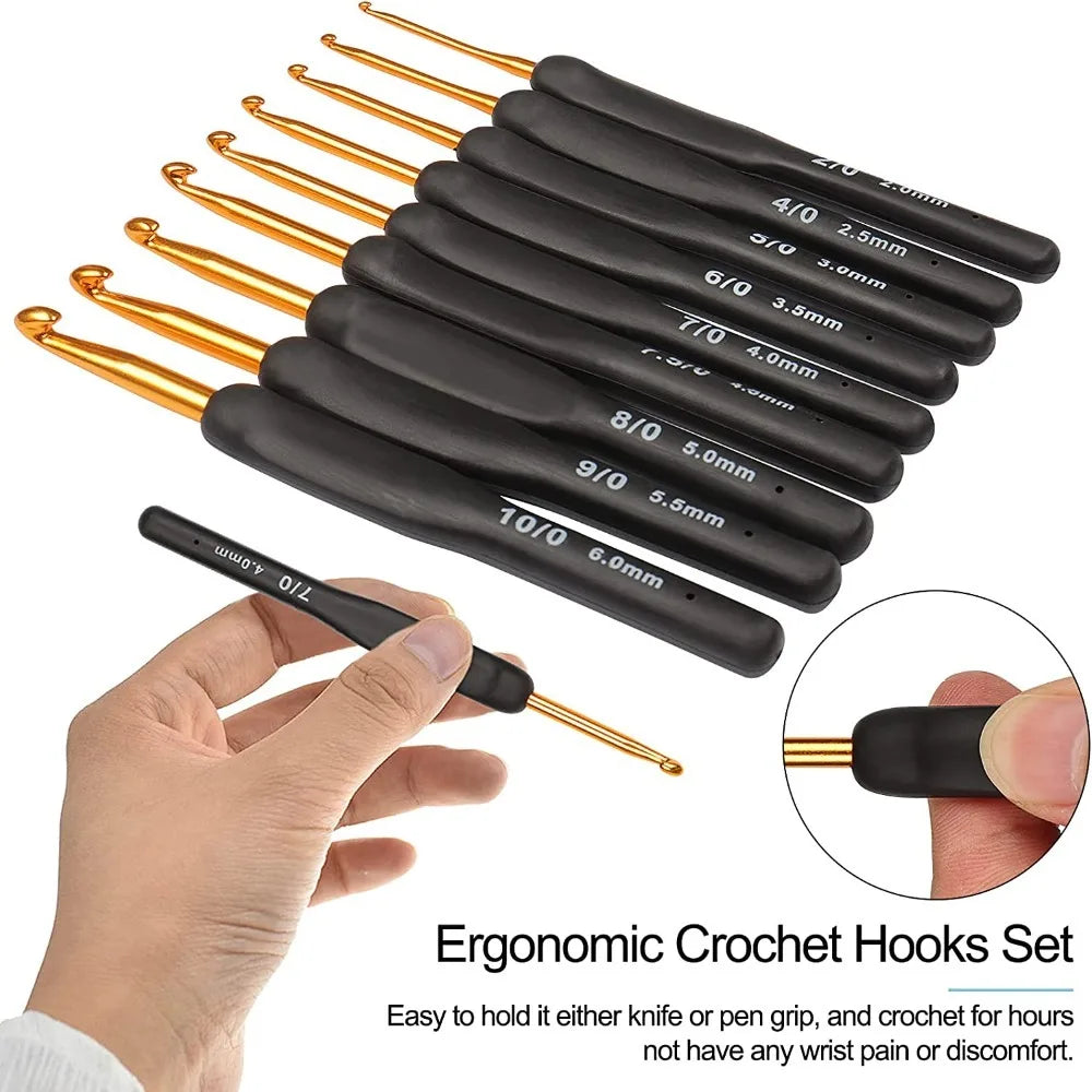 A set of eight black and gold ergonomic crochet hooks are shown being held by a hand.