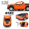 Orange 1:36 scale die-cast model of a Ford F-150 off-road pickup truck with a pull-back action.