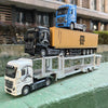 A 1:50 scale diecast truck carrying a yellow container, with a blue truck on the trailer in the background.
