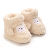 Pair of light beige faux fur baby winter cartoon boots with soft non-slip soles