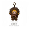 A small collectible figure of a character named Sneaky Chestnut with brown fur and blonde hair.