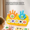 A child plays with a yellow Montessori finger counting math toy featuring numbers and operations cards.