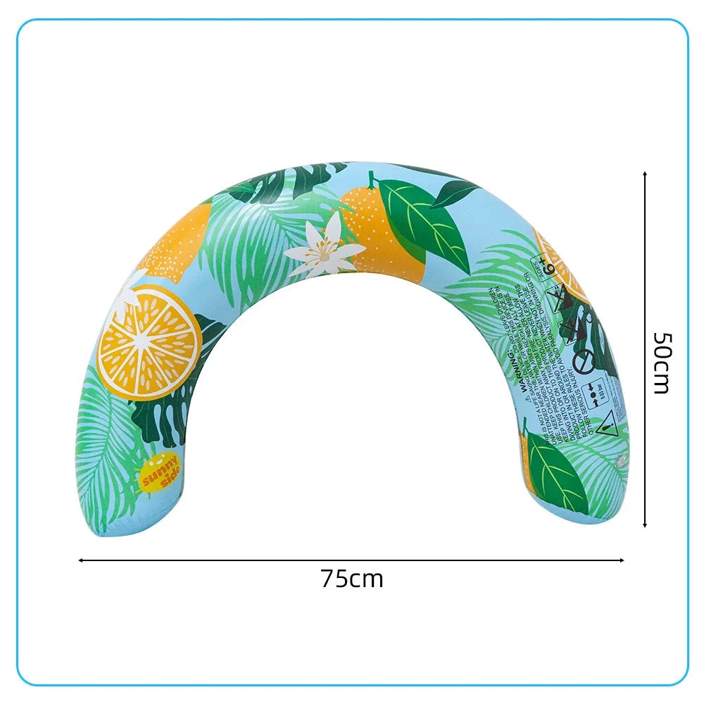 A green and yellow U-shaped inflatable swim ring with leaf and citrus patterns, shown from the side.