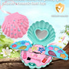 A pink and teal cosmetic shell toy set for children featuring a heart-shaped mirror and various makeup items.