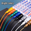 A collection of eight bright colored permanent paint markers shown in a diagonal arrangement.