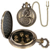 A brass steampunk dragon pocket watch dice case with a hinged lid and a chain.