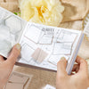 Hands display a set of dual-material frame stickers for journaling and scrapbooking on a light beige background.
